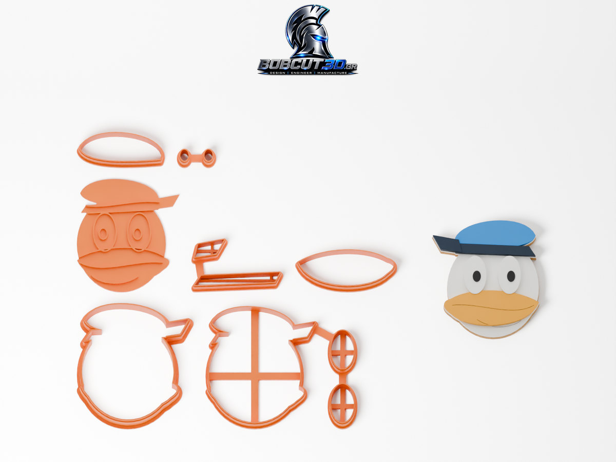 Cookie Cutter - Donald Duck: πλήρες σετ εργαλείων δίπλα στο διακοσμημένο μπισκότο