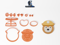 Cookie Cutter - Rubble: πλήρες σετ εργαλείων δίπλα στο διακοσμημένο μπισκότο